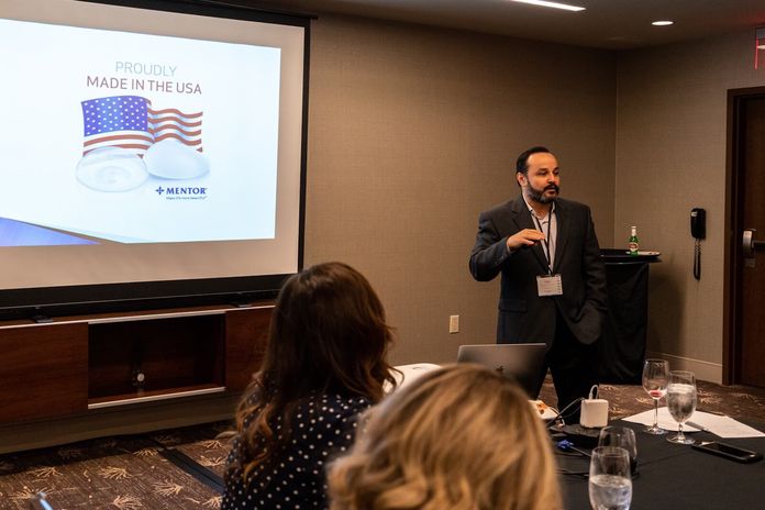 Dr. Guerra speaking at a seminar