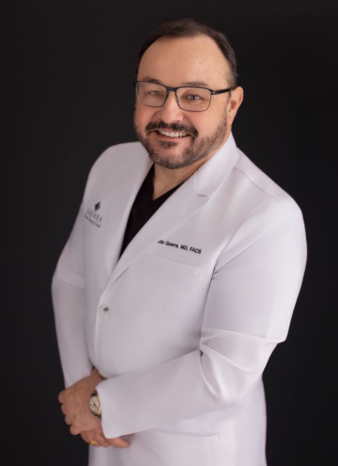 Dr. Guerra in white labcoat